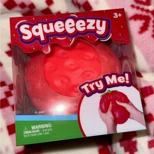 Squeezy Strawberry Scented Squishy Toy - Red with Green Top